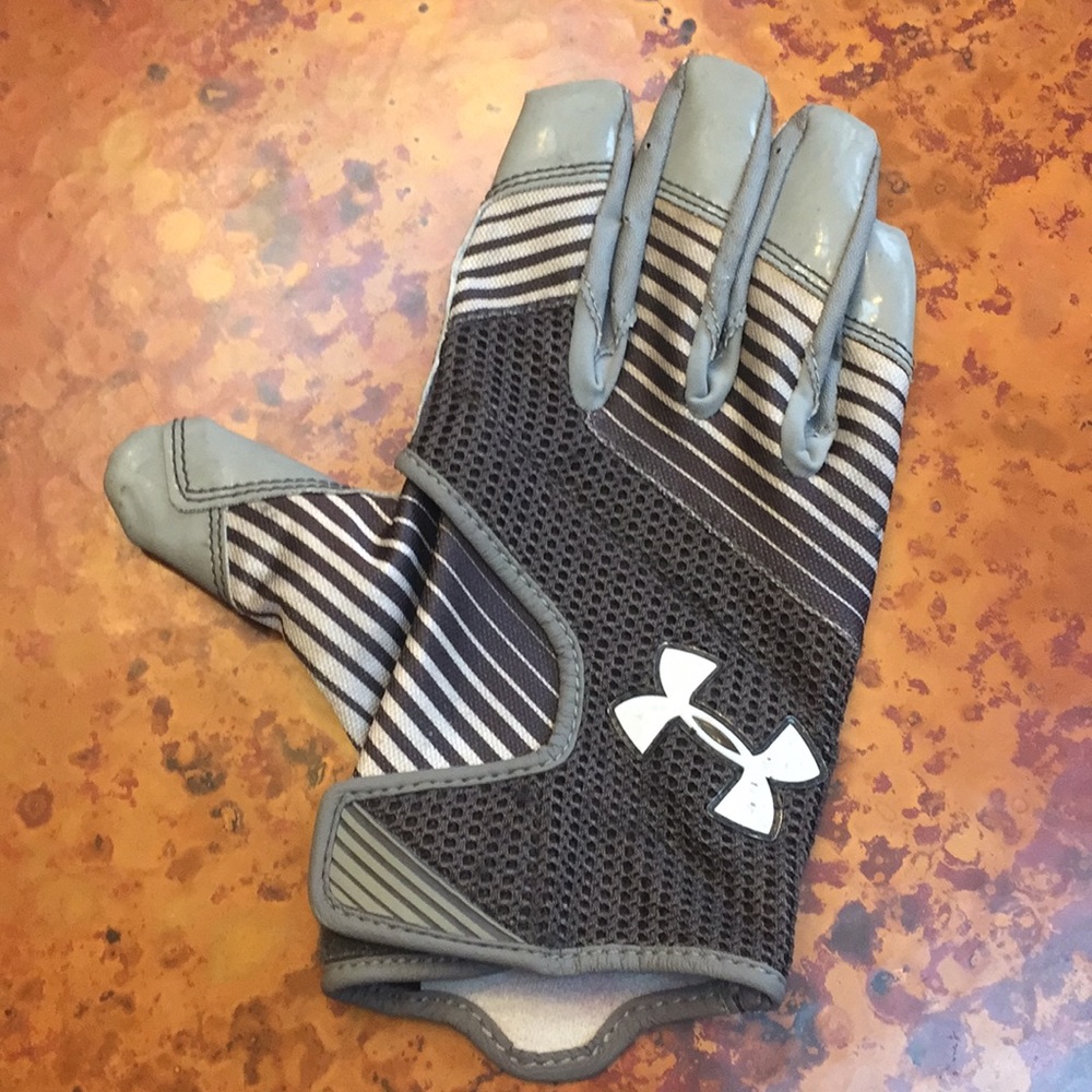 Under Armour Boys football glove for  right hand.